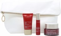 Click to view product details and reviews for Clarins haute exigence gift set 50ml super restorative day cream 15ml super restorative night cream 10ml super restorative serum pouch.